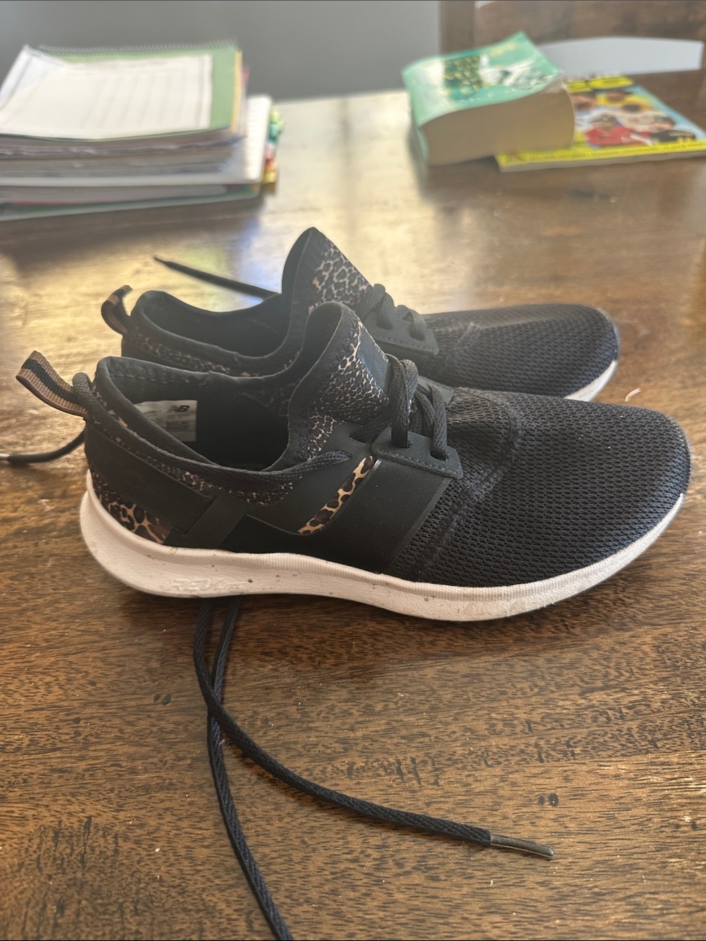 New Balance Black Athletic Sneakers with Leopard Print Accent